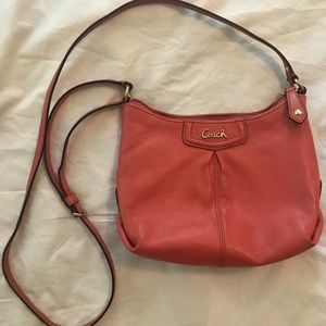 Coral leather Coach crossbody sling bag